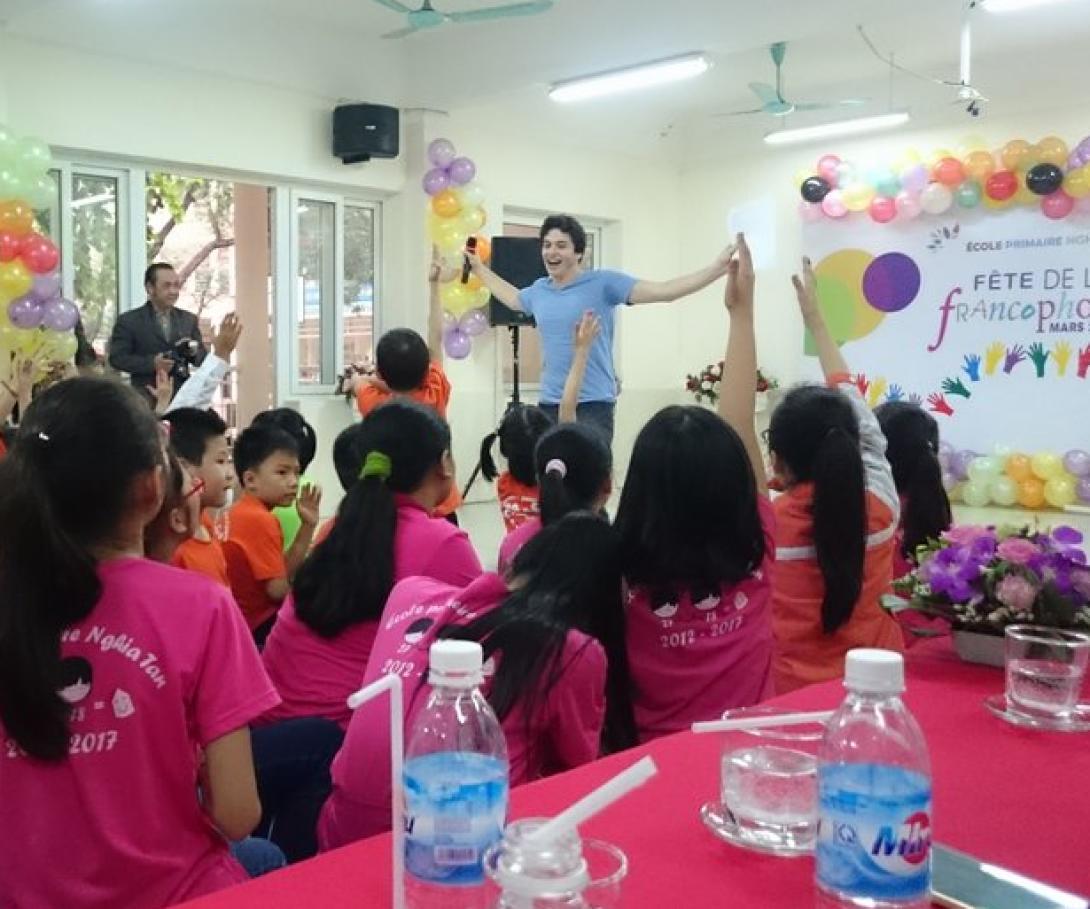 A student from Westpoint University gives a presentation to children in Vietnam during his group volunteer trip. A student from Westpoint University gives a presentation to children in Vietnam during his group volunteer trip.